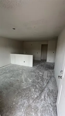 a view of a room with an empty space