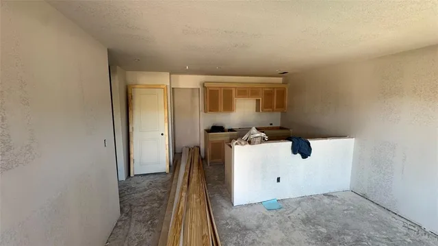 a utility room with sink dryer and washer