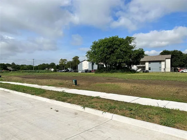 a view of a swimming pool and a yard