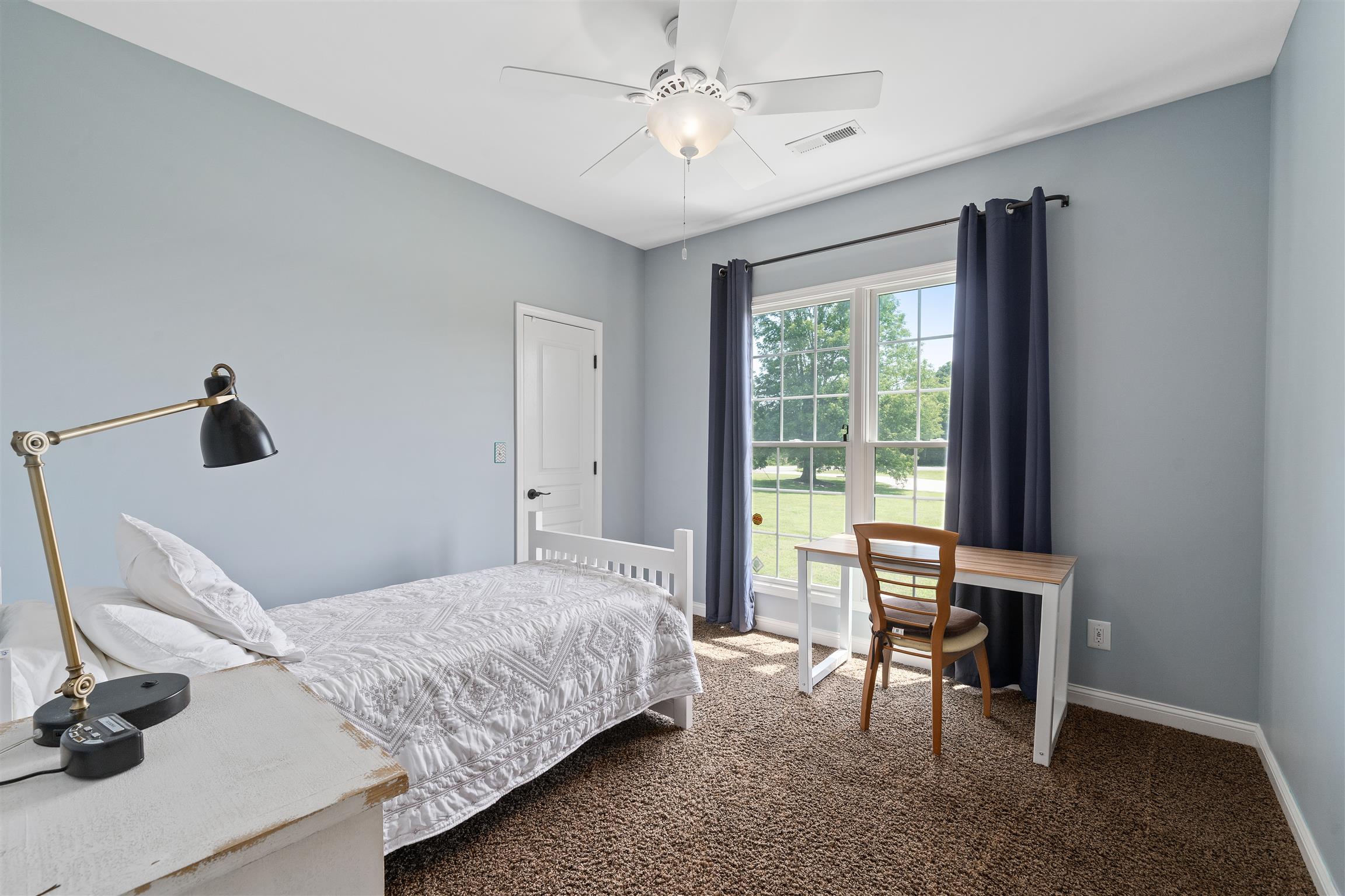 2570 Gunn Road Adams, TN 37010 - Photo 22 of 27 a bedroom with a bed and a window