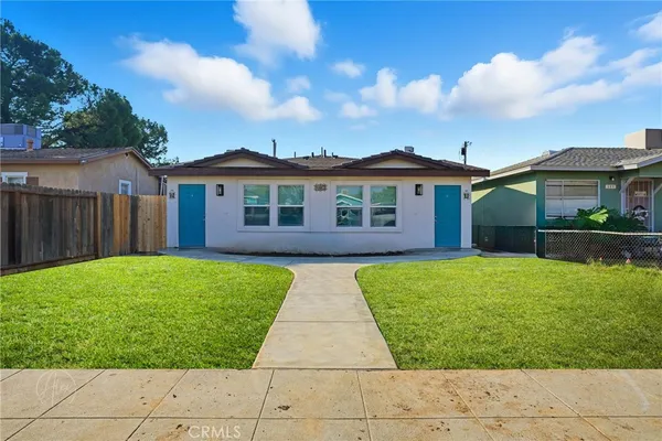 a view of outdoor space yard and front view of a house