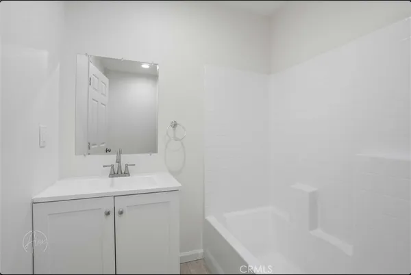 a bathroom with a sink and a bathtub