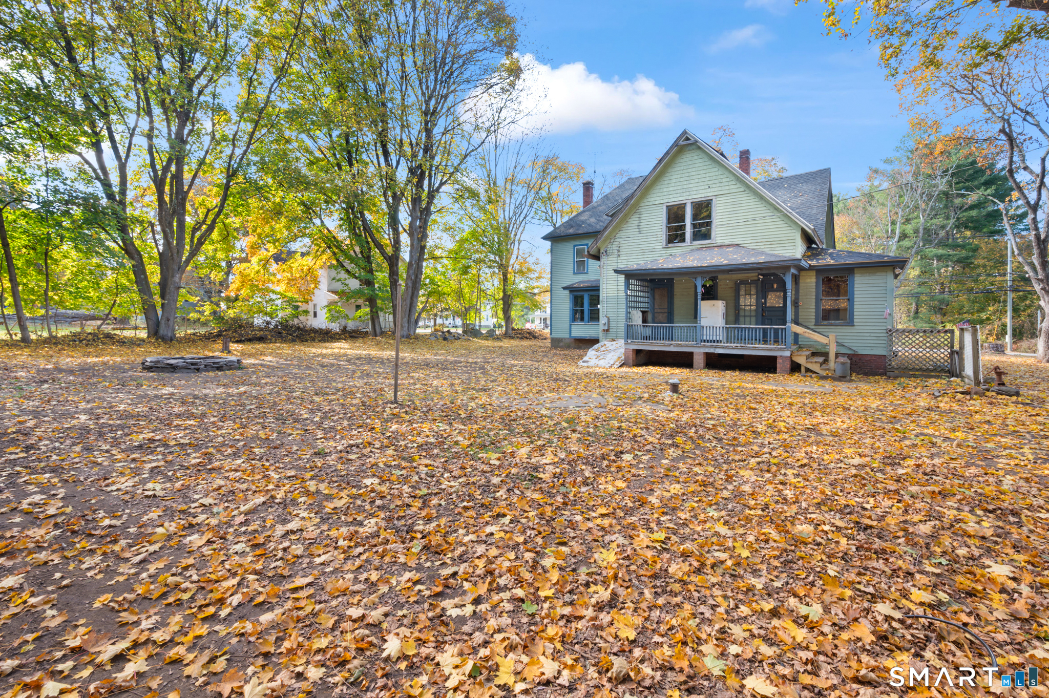 124 River Road Willington, CT 06279 - Photo 4 of 40 front view of a house with a street