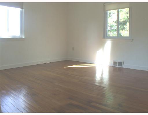 122 Flora Road Baldwin, PA 15227 - Photo 5 of 8 Master Bedroom. Bedroom with gleaming hardwood floors.