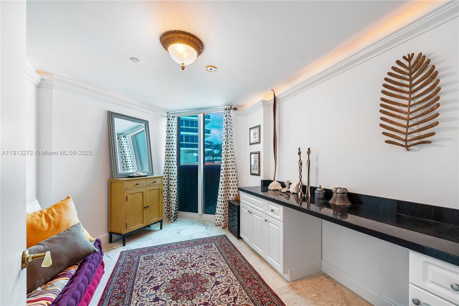 9559 Collins Avenue, Unit S108 Surfside, FL 33154 - Photo 6 of 9 a very nice looking room with a large window