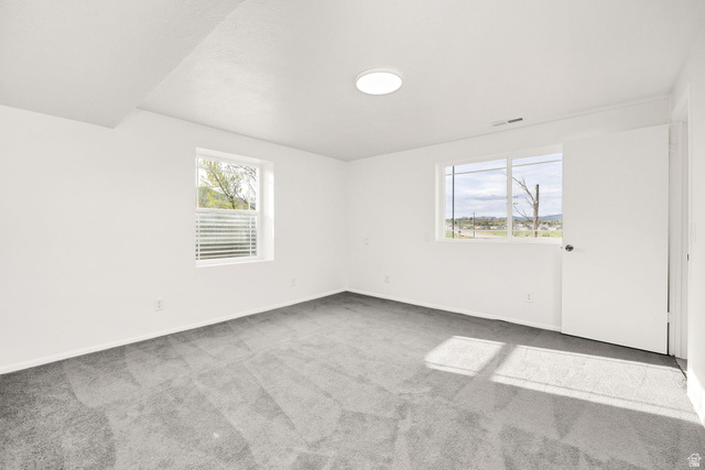 4155 Johnson Road Nibley, UT 84321 - Photo 38 of 71 Unfurnished room with light colored carpet and healthy amount of natural light