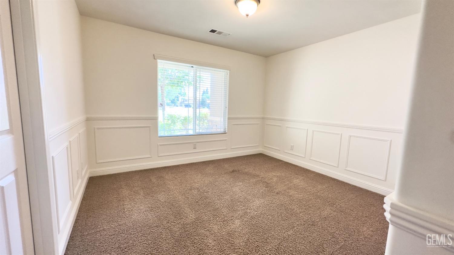 Undisclosed Address Bakersfield, CA 93311 - Photo 11 of 48 an empty room with a window