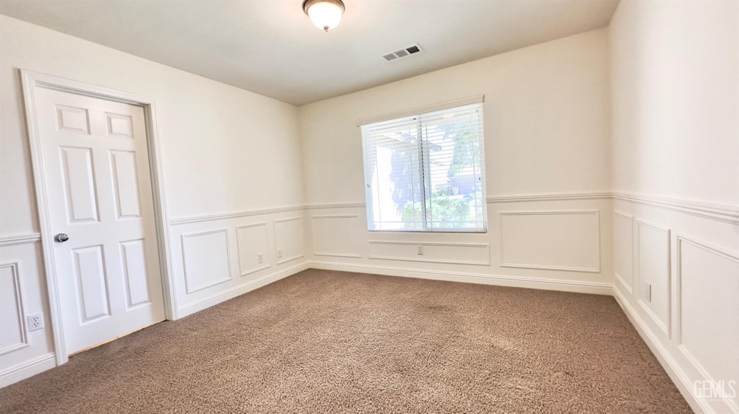 Undisclosed Address Bakersfield, CA 93311 - Photo 12 of 48 an empty room with windows