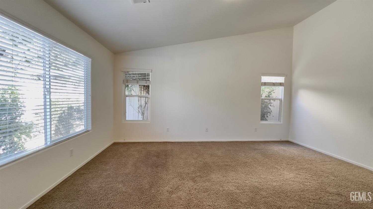 Undisclosed Address Bakersfield, CA 93311 - Photo 15 of 48 an empty room with windows