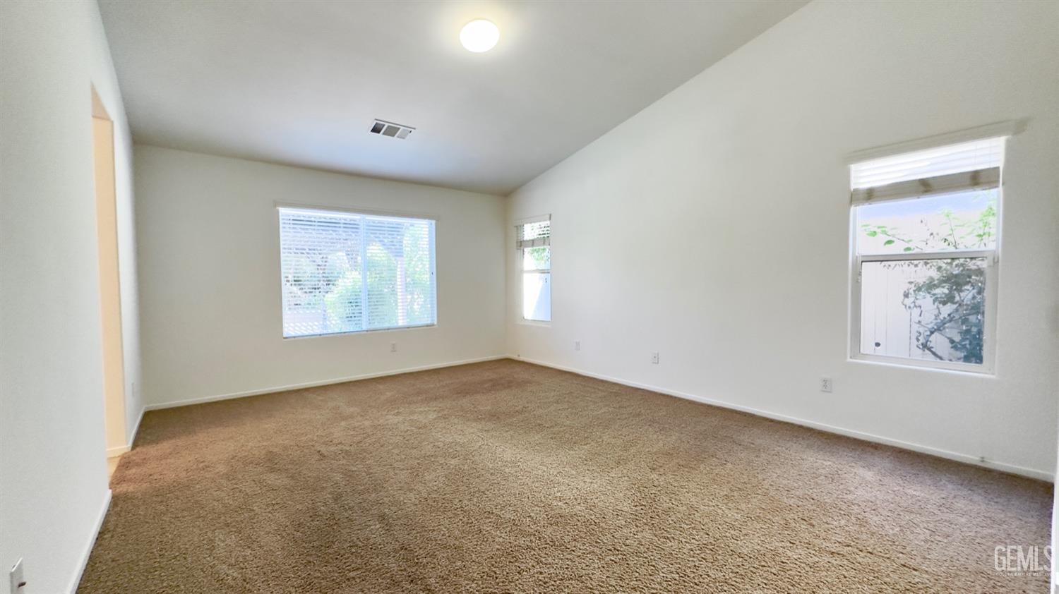 Undisclosed Address Bakersfield, CA 93311 - Photo 16 of 48 an empty room with windows