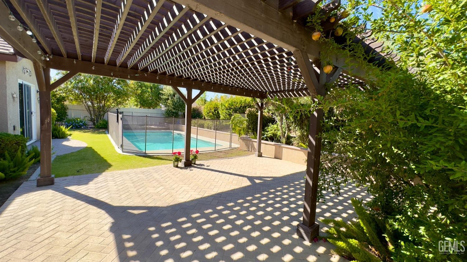 Undisclosed Address Bakersfield, CA 93311 - Photo 19 of 48 a view of a backyard with sitting area