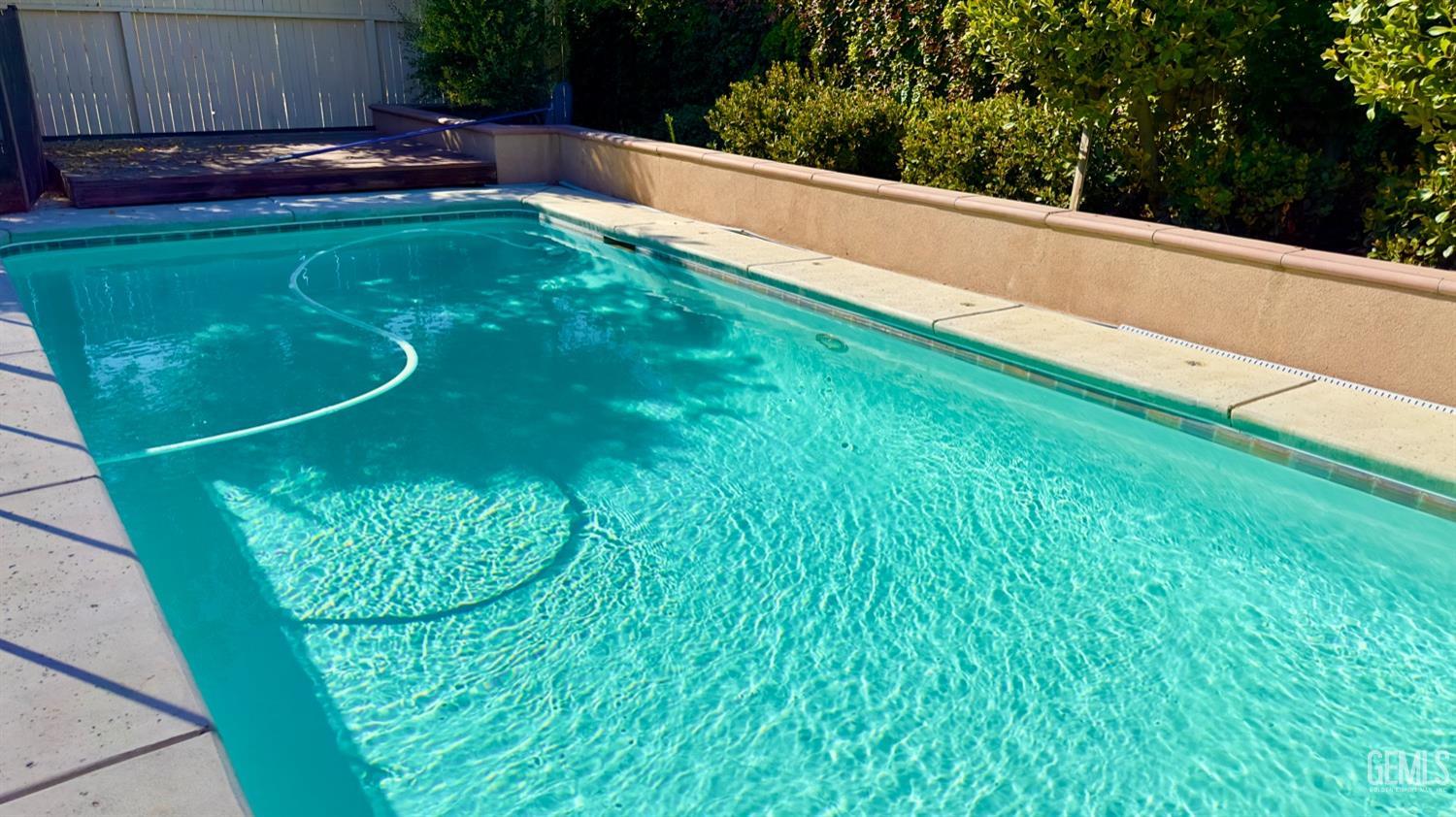 Undisclosed Address Bakersfield, CA 93311 - Photo 24 of 48 a view of a yard with large trees