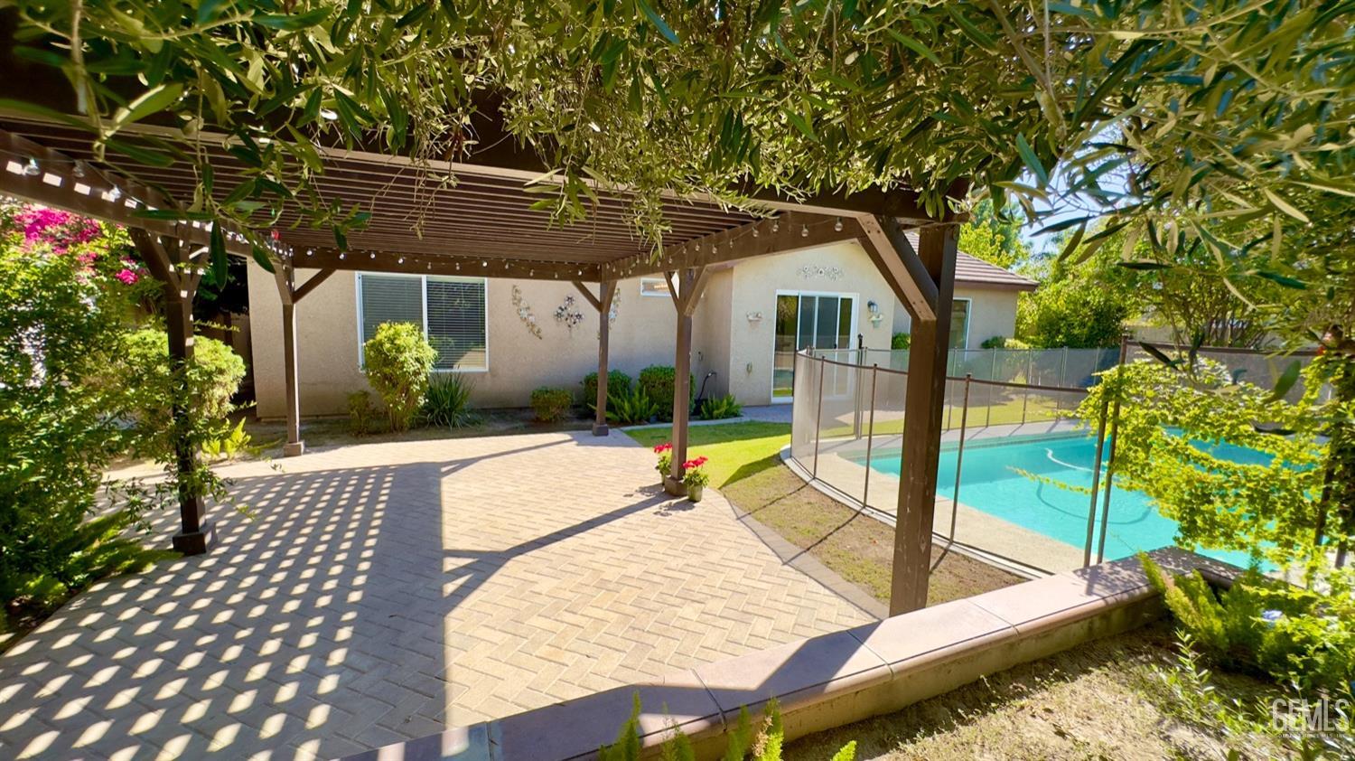 Undisclosed Address Bakersfield, CA 93311 - Photo 25 of 48 a view of swimming pool with a patio