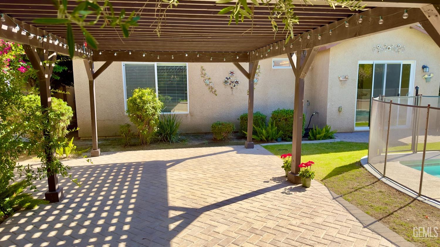Undisclosed Address Bakersfield, CA 93311 - Photo 29 of 48 a view of a house with backyard and porch