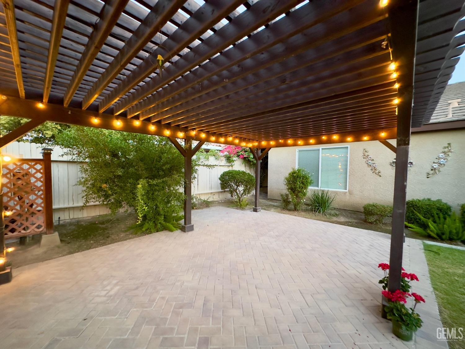 Undisclosed Address Bakersfield, CA 93311 - Photo 45 of 48 a view of porch with a table and a chairs