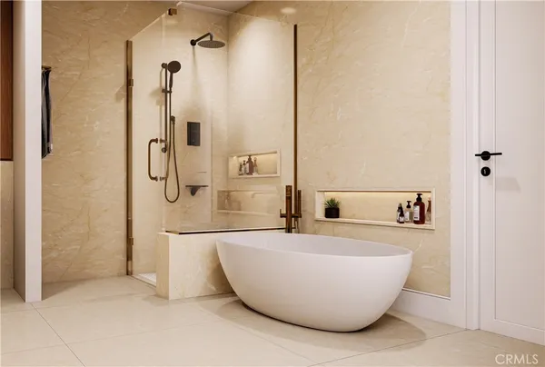 a white bath tub sitting next to a white sink