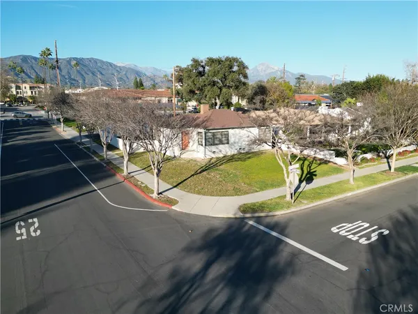 a house with trees in the background