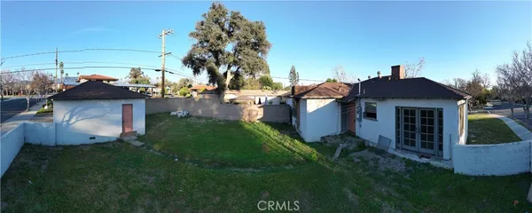 an aerial view of a house with a garden