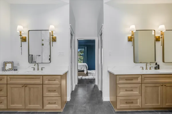a bathroom with a bathtub and shower