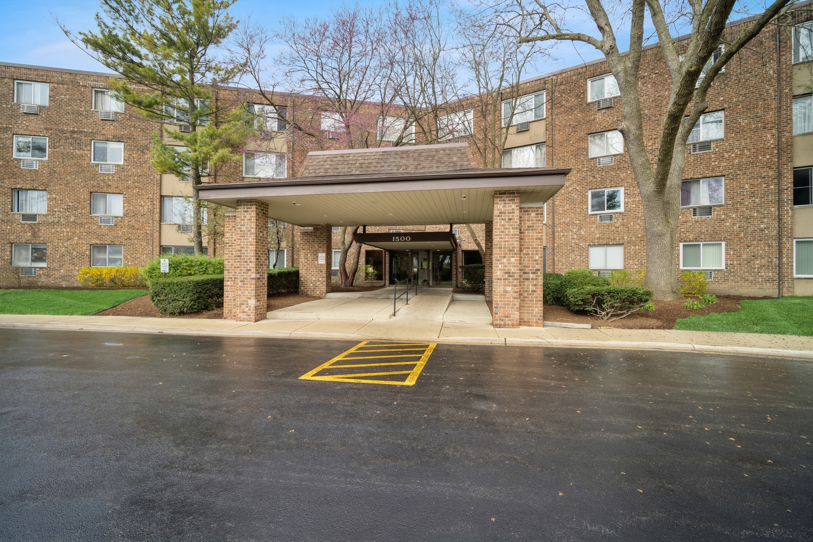a view of a building with a street