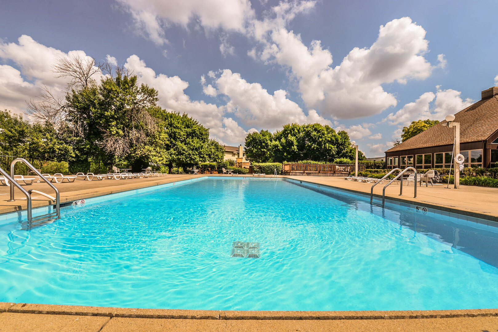 1500 Robin Circle, Unit 101 Hoffman Estates, IL 60169 - Photo 19 of 20 a view of a swimming pool with an outdoor seating