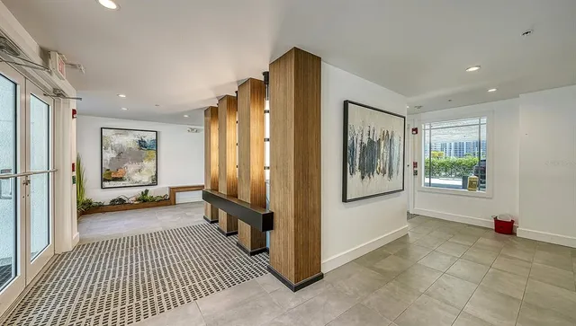 a view of a swimming pool with an outdoor seating