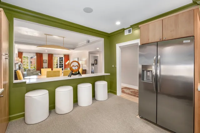 a kitchen with counter top space cabinets and stainless steel appliances