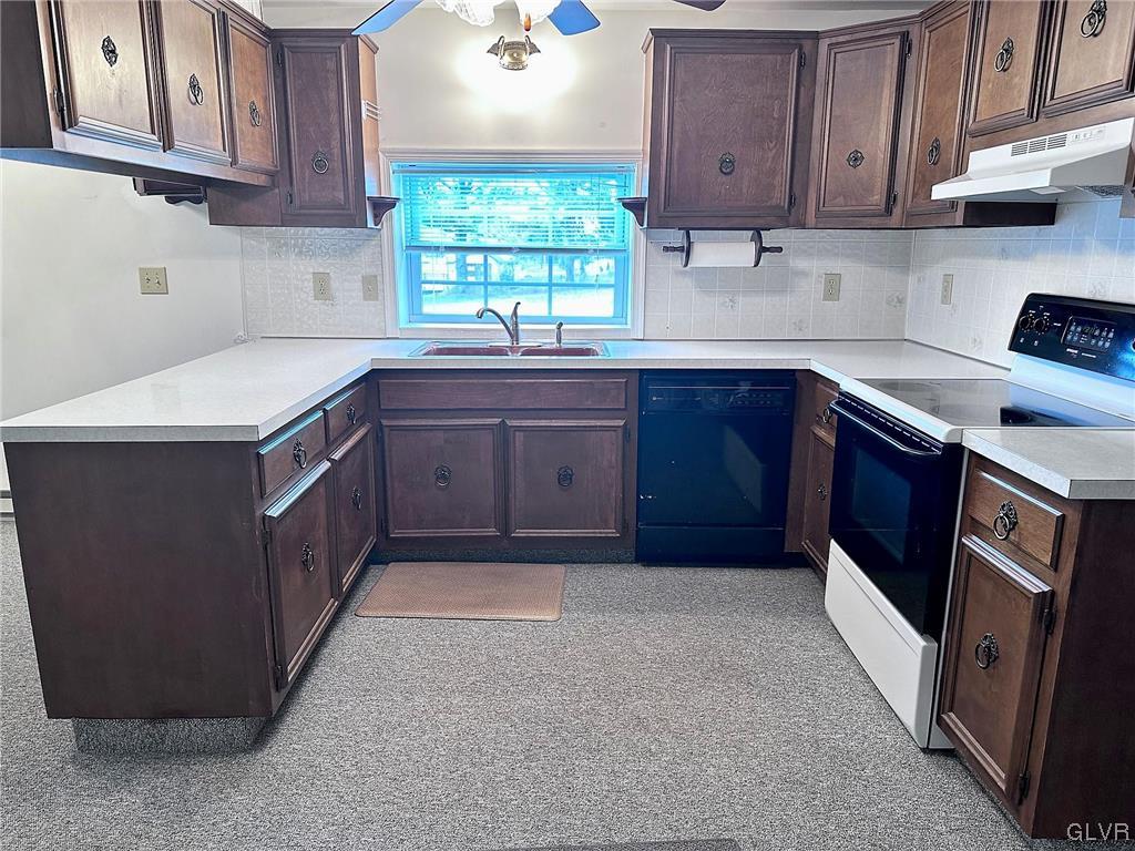 3709 Fairview Street Bethlehem, PA 18017 - Photo 18 of 35 a kitchen with stainless steel appliances granite countertop a sink stove and cabinets