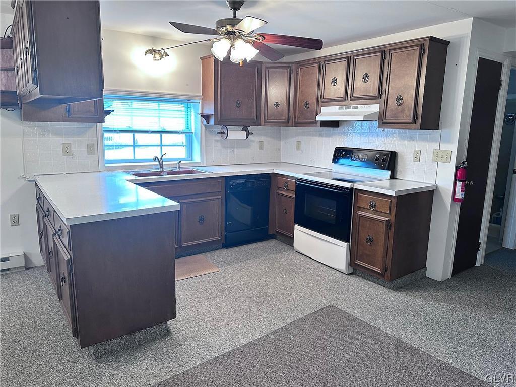 3709 Fairview Street Bethlehem, PA 18017 - Photo 19 of 35 a kitchen with stainless steel appliances granite countertop a sink stove and refrigerator
