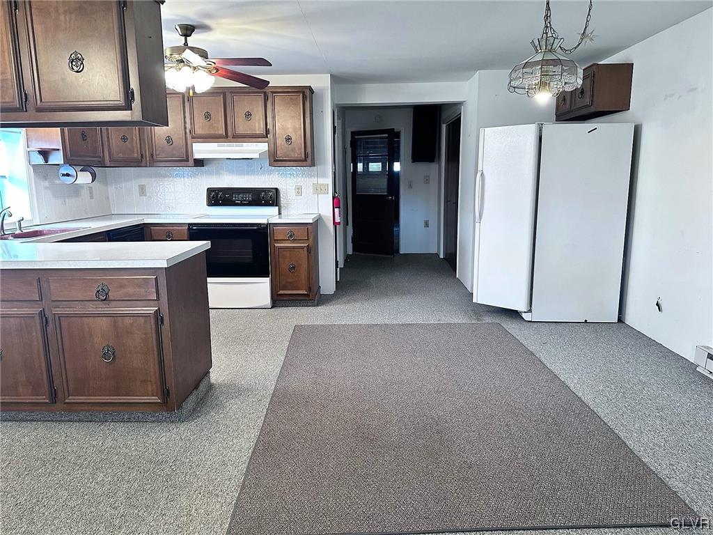 3709 Fairview Street Bethlehem, PA 18017 - Photo 21 of 35 a kitchen with stainless steel appliances granite countertop a refrigerator a sink dishwasher a stove and a cabinets
