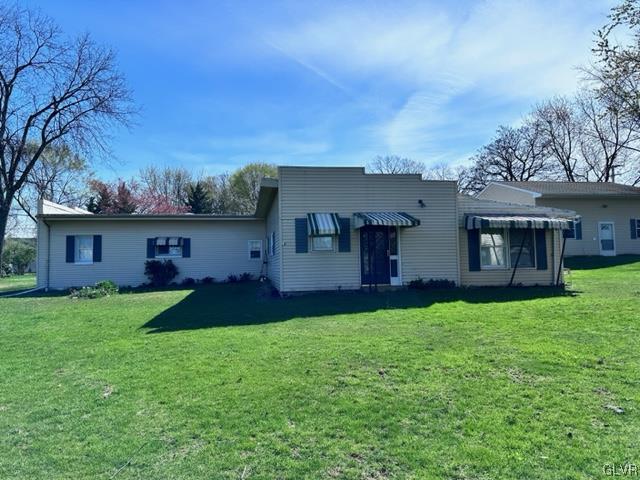 3709 Fairview Street Bethlehem, PA 18017 - Photo 28 of 35 a front view of a house with a garden