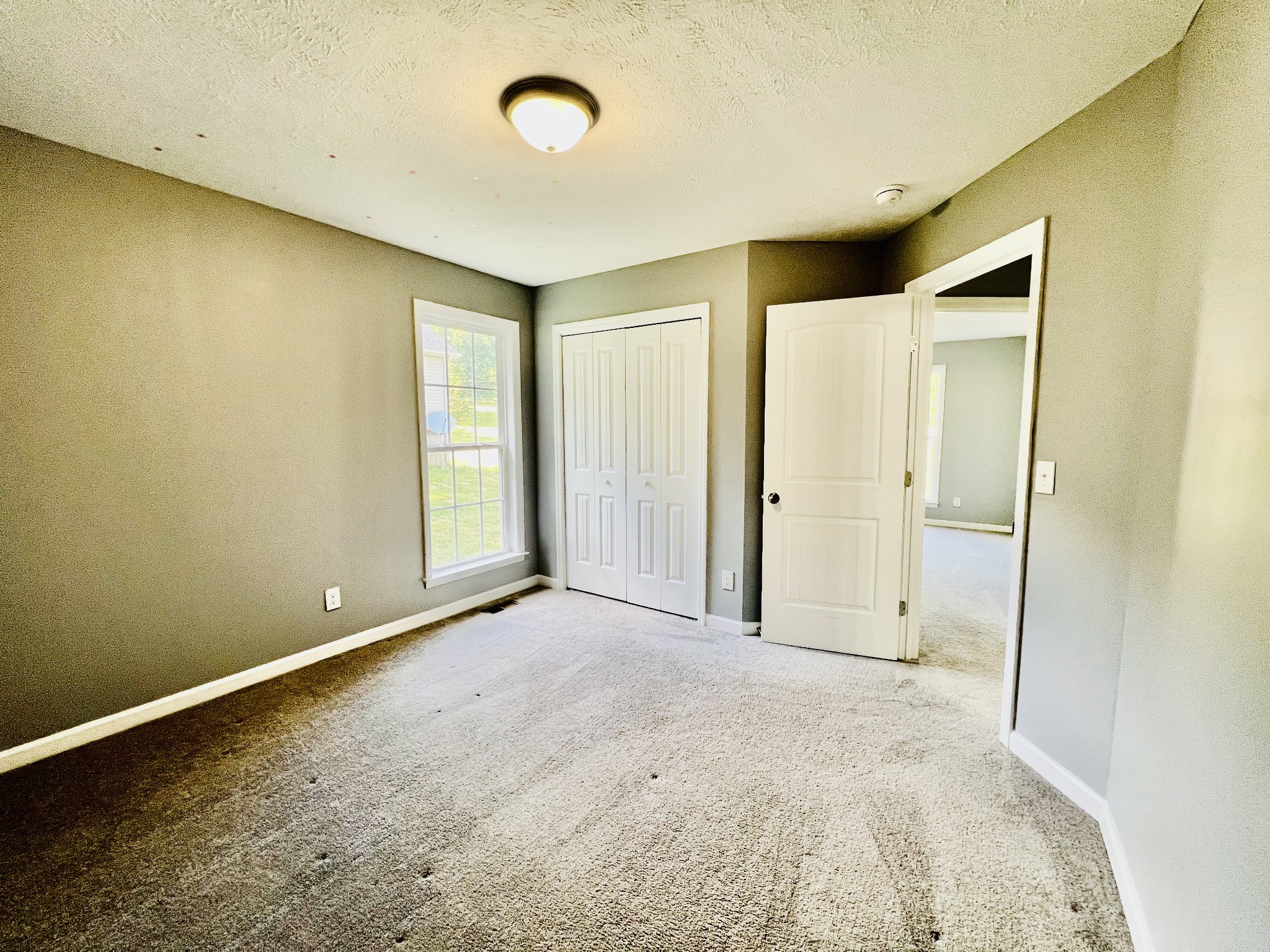 770 Bunker Hill Road Pulaski, TN 38478 - Photo 16 of 26 an empty room with a natural light