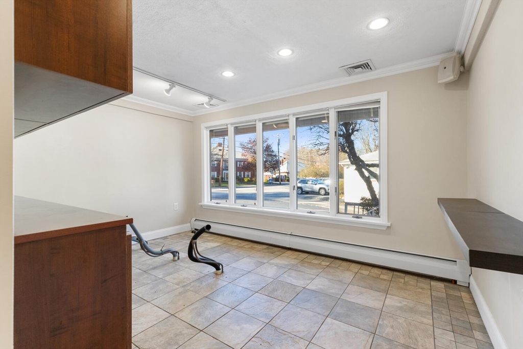 231 Bedford Street Lexington, MA 02420 - Photo 12 of 31 a view of an empty room with a window