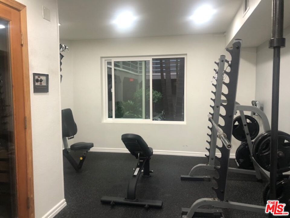 8300 Manitoba Street, Unit 209 Playa del Rey, CA 90293 - Photo 17 of 22 a view of a workspace with furniture and a window