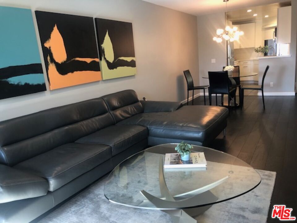 8300 Manitoba Street, Unit 209 Playa del Rey, CA 90293 - Photo 2 of 22 a living room with furniture