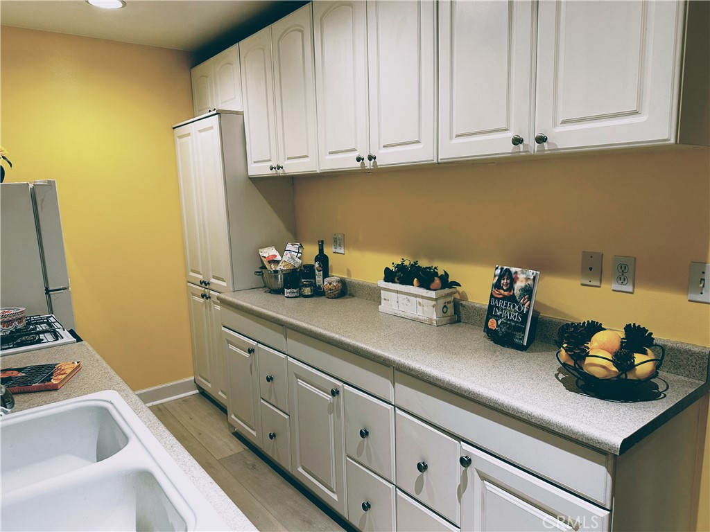 722 East Foothill Boulevard Monrovia, CA 91016 - Photo 6 of 12 a kitchen with sink and cabinets