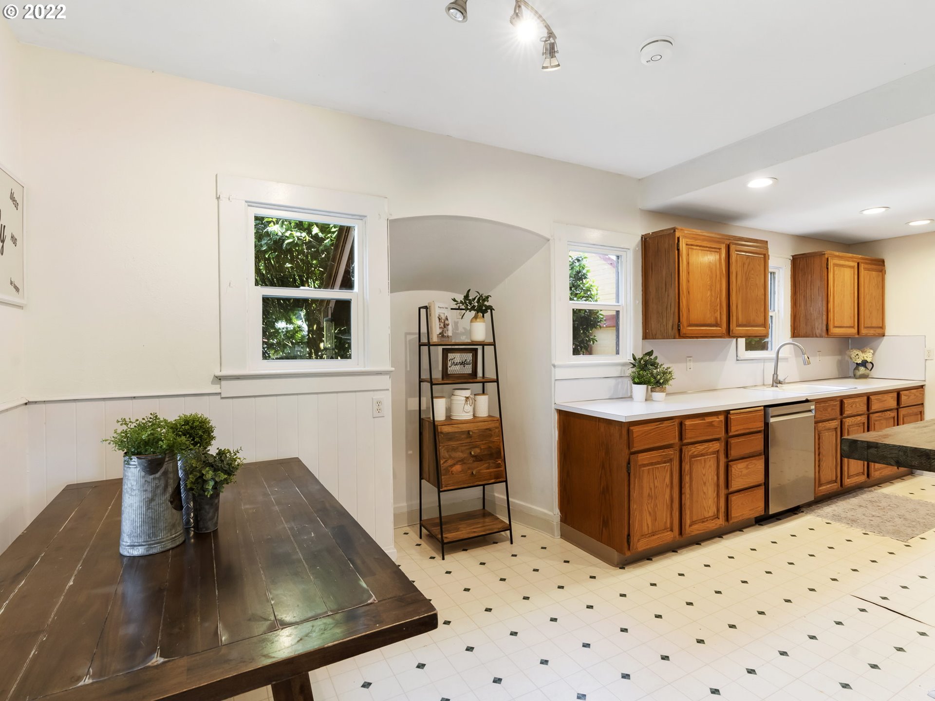 1689 Southwest Stringtown Road Forest Grove, OR 97116 - Photo 11 of 28 a kitchen with sink cabinets and appliances