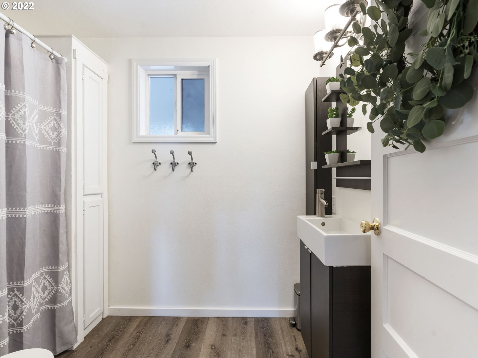 1689 Southwest Stringtown Road Forest Grove, OR 97116 - Photo 19 of 28 a bathroom with a sink and mirror