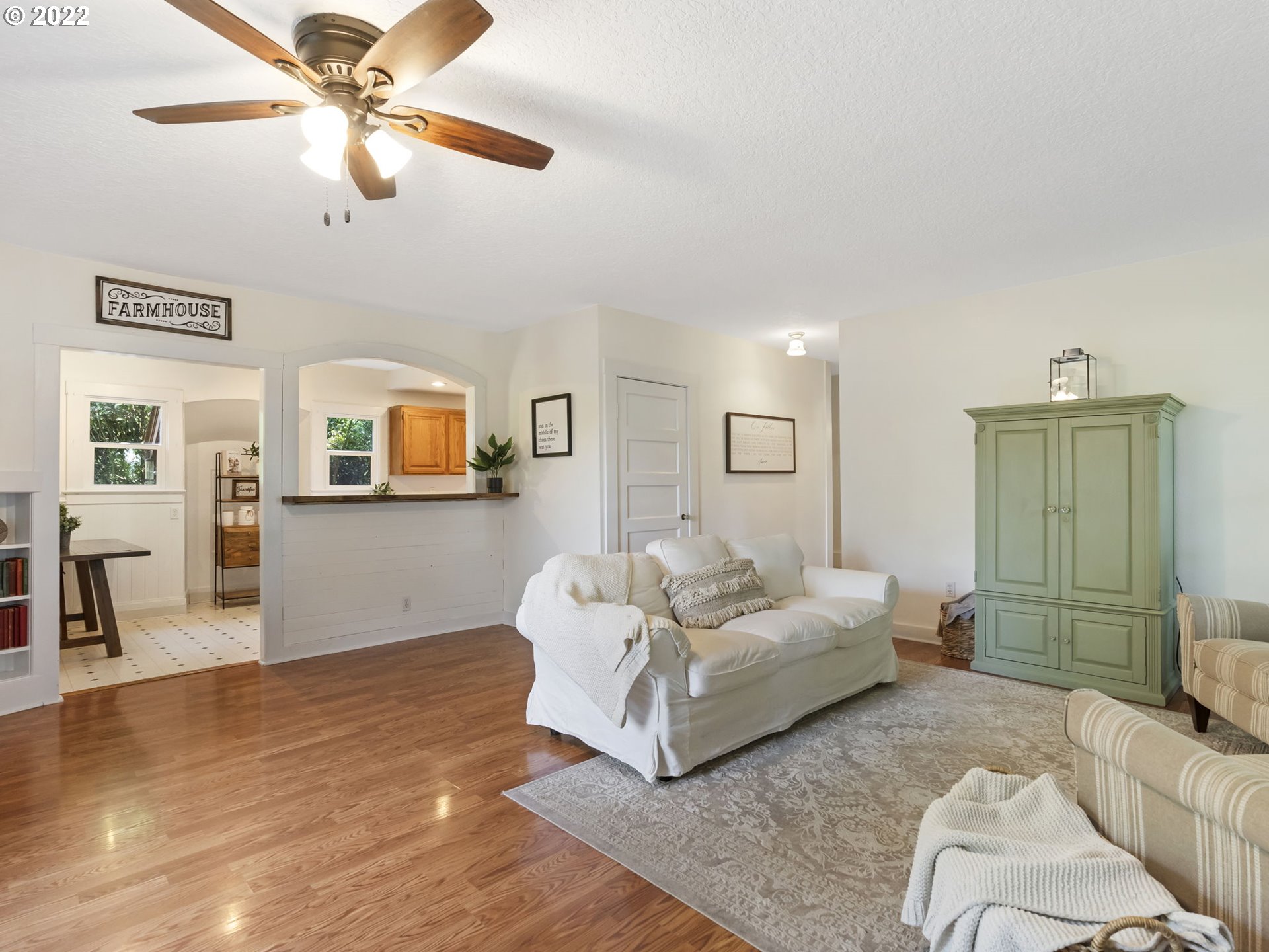 1689 Southwest Stringtown Road Forest Grove, OR 97116 - Photo 7 of 28 a living room with furniture and a wooden floor