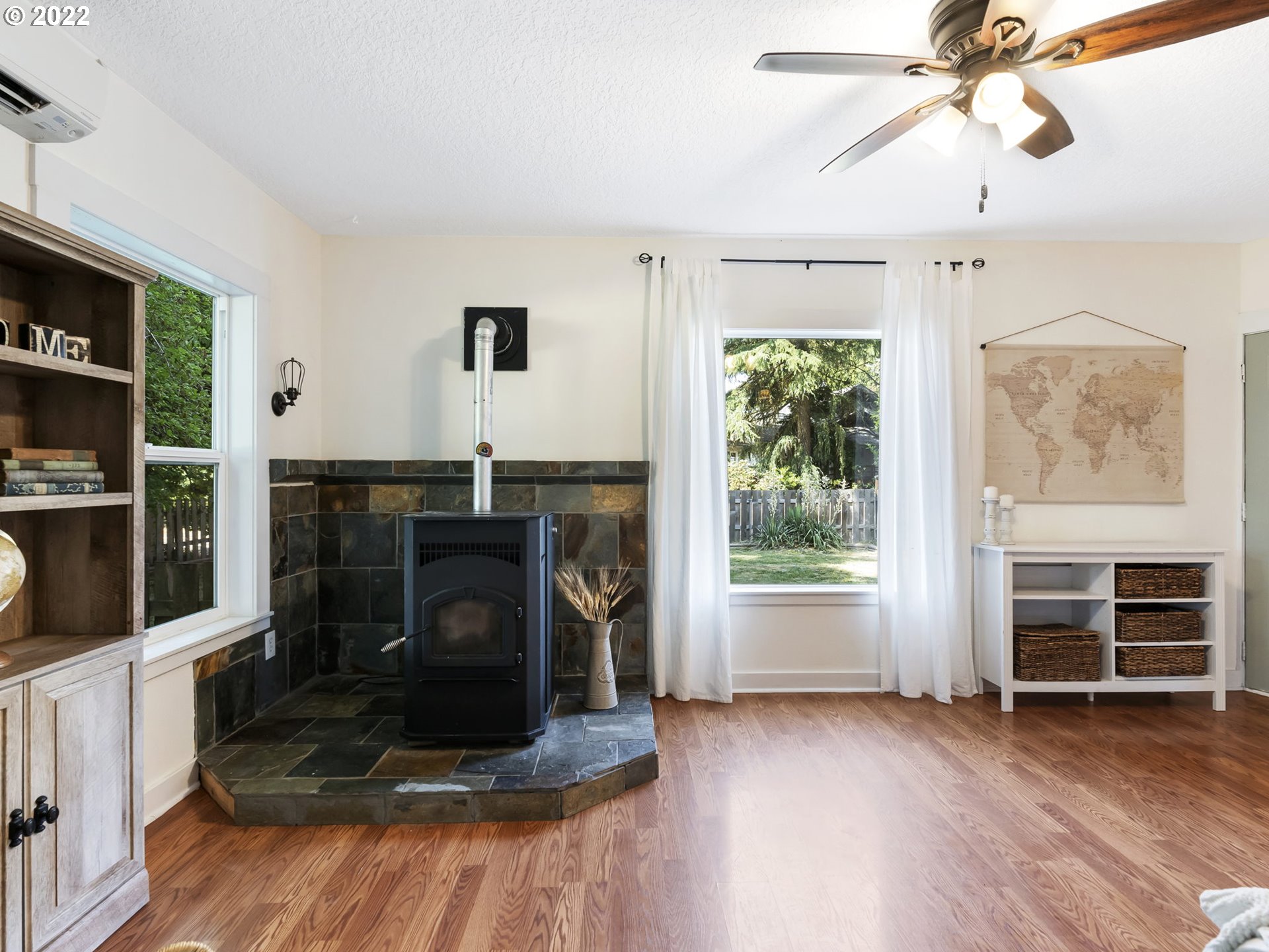 1689 Southwest Stringtown Road Forest Grove, OR 97116 - Photo 9 of 28 a living room with furniture and a fireplace