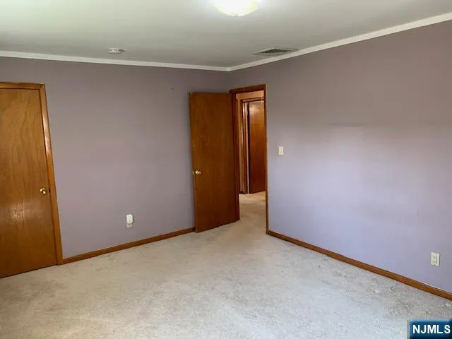 an empty room with window