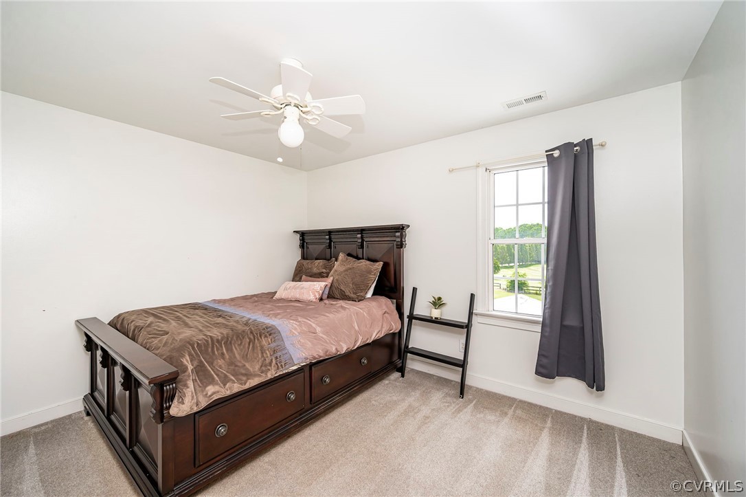 17410 Jericho Drive Beaverdam, VA 23015 - Photo 29 of 41 a bedroom with a bed and window