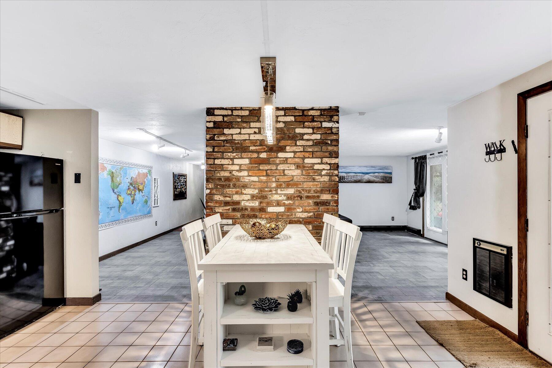 1007 River Road Marstons Mills, MA 02648 - Photo 13 of 33 a view of a hallway with fireplace and furniture