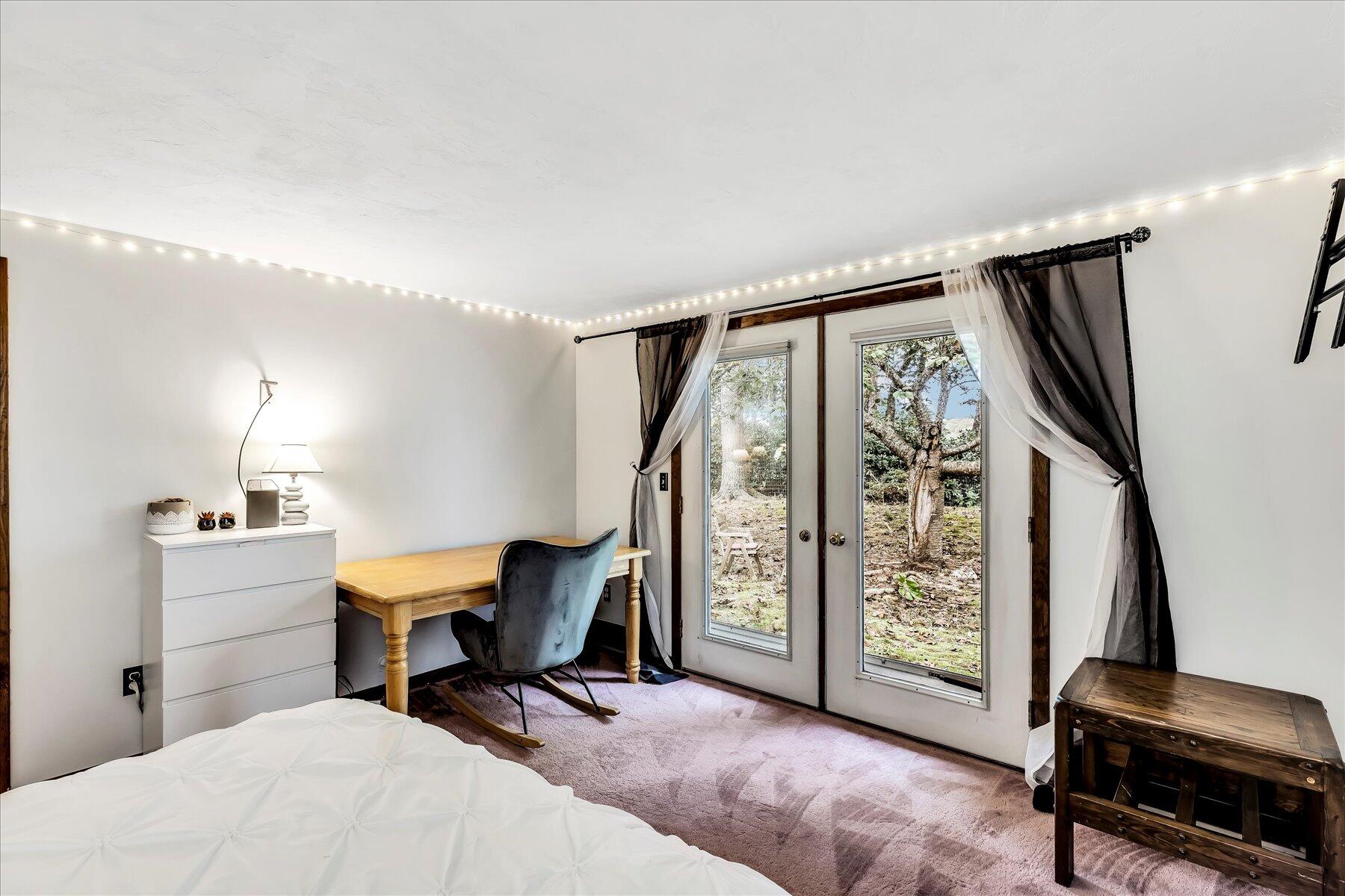 1007 River Road Marstons Mills, MA 02648 - Photo 22 of 33 a view of a livingroom with furniture and a window