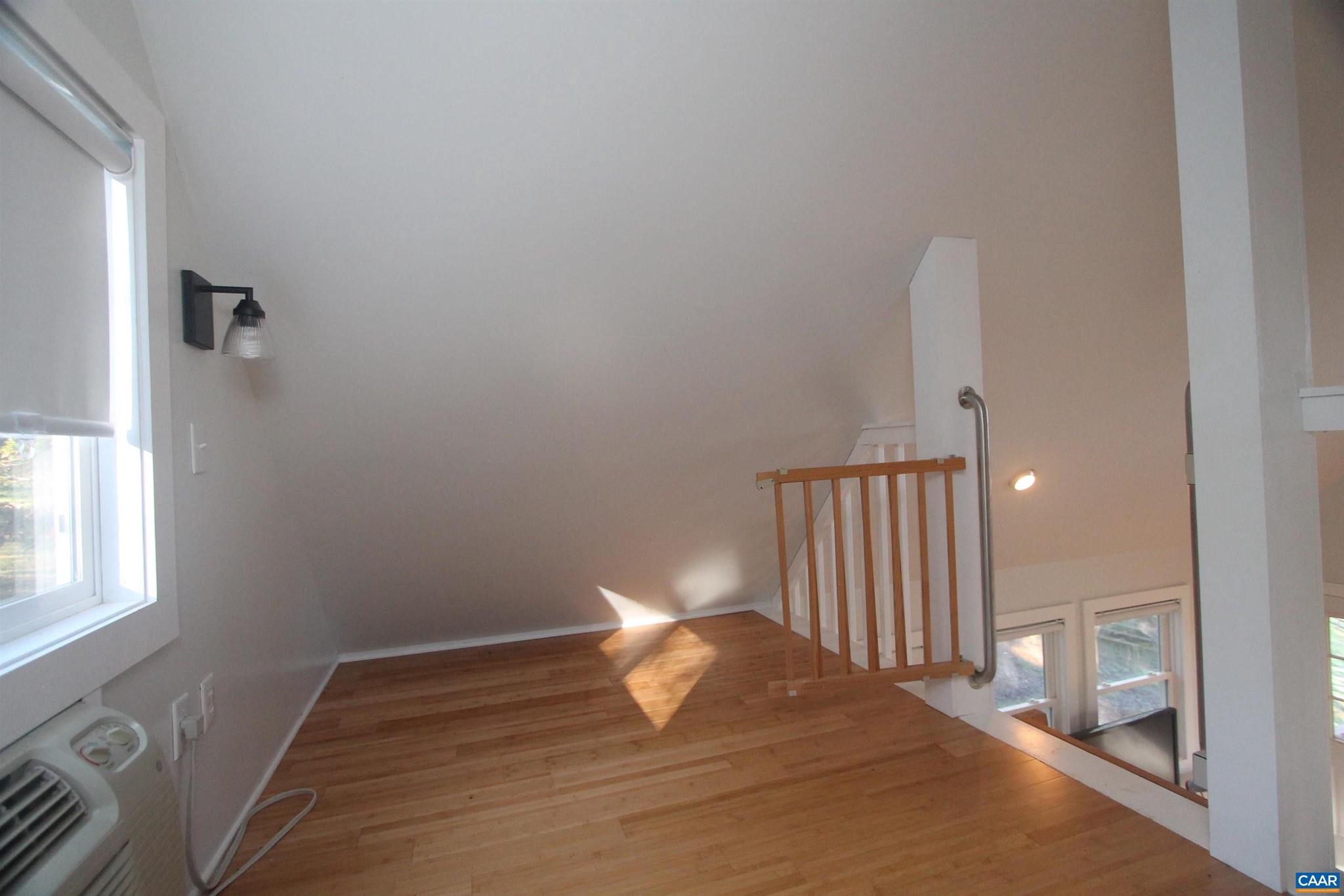 Tbd Batesville Road, Unit 2 Afton, VA 22920 - Photo 19 of 28 a bedroom with a bed and a window