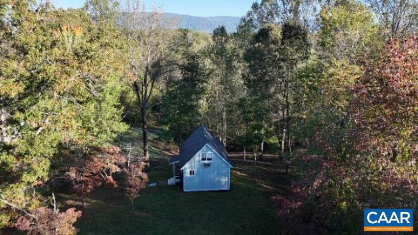 Tbd Batesville Road, Unit 2 Afton, VA 22920 - Photo 10 of 28 a view of house with yard and trees in the background