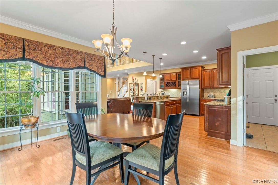 13206 Tipple Point Road Midlothian, VA 23114 - Photo 12 of 50 a view of a dining room and livingroom view