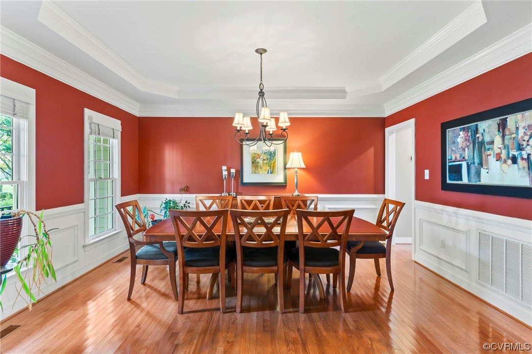 13206 Tipple Point Road Midlothian, VA 23114 - Photo 14 of 50 a view of a dining room with furniture window and wooden floor