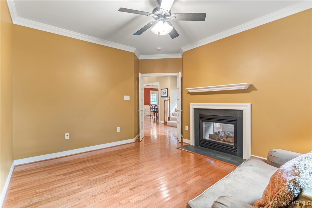 13206 Tipple Point Road Midlothian, VA 23114 - Photo 15 of 50 a living room with furniture and a fireplace