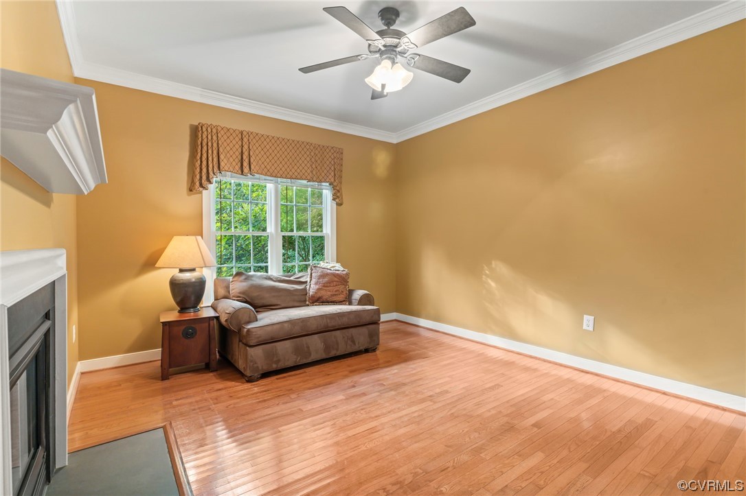 13206 Tipple Point Road Midlothian, VA 23114 - Photo 16 of 50 a living room with furniture and a large window